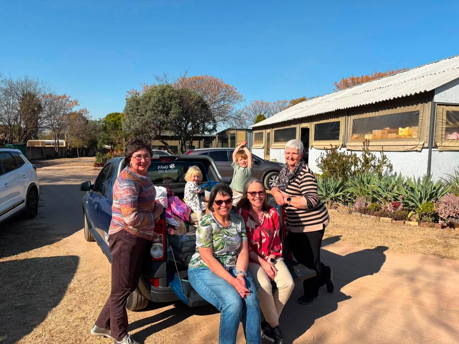 The Cat Family Foundation team with rescued cats